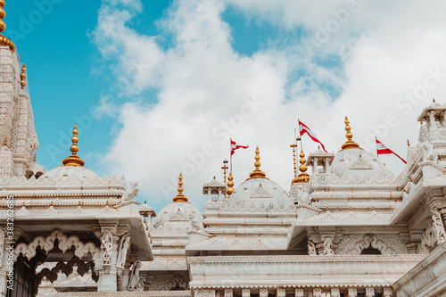 View of beautiful Swaminarayan temple with clouds in sky. At Bhuj, Kutch, India. photo