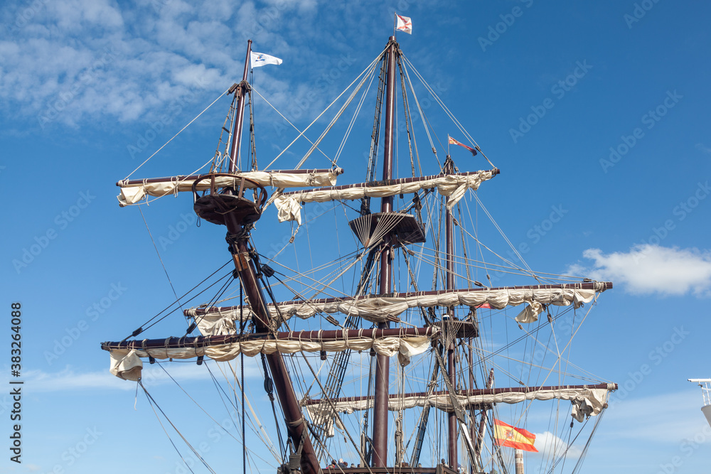 Ship wooden mast and rigging on an old galleon navy vessel