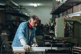 Aluminium and PVC industry worker making PVC frames for windows