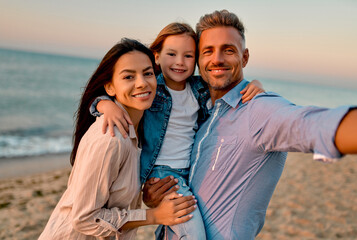 Happy family on the beach