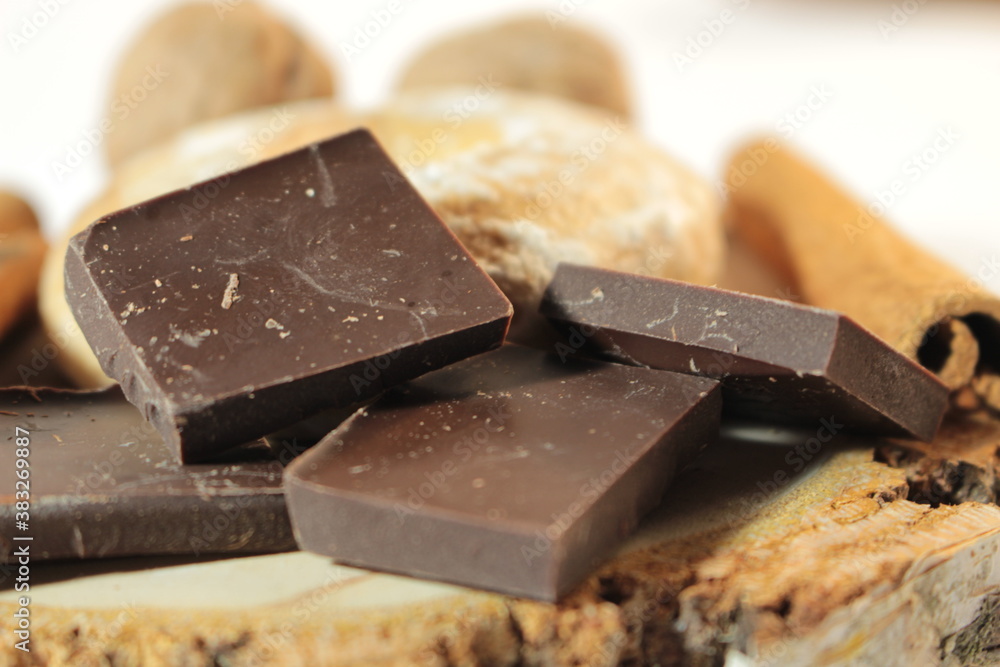 Coffee beans, cinnamon, round gingerbread, chocolate Coffee beans, cinnamon, round gingerbread, chocolate