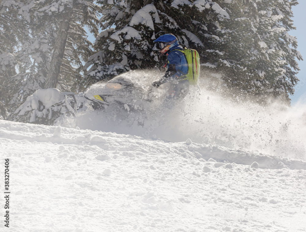 Extreme Snowmobile Ride & Racing. jump and ride in a big avalanche on a snowmobile with snow splashes and a storm