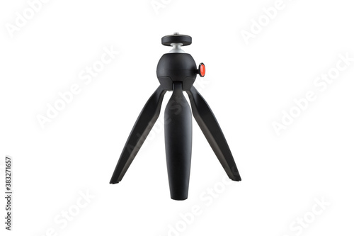 Black tripod isolated on a white background, mini tripod for DSLR camera, close-up photo