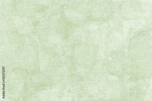 Vintage and old looking paper background. Colored green retro book cover. Ancient book page.