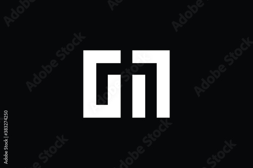 Minimal Innovative Initial GM logo and MG logo. Letter G M MG GM creative elegant Monogram. Premium Business logo icon. White color on black background