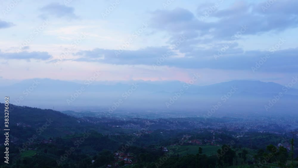 Timelapse of clouds at dawn around amazing mountain in bandung, Indonesia Timelapse of clouds at dawn around amazing mountain in bandung, Indonesia