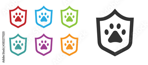 Black Animal health insurance icon isolated on white background. Pet protection concept. Dog or cat paw print. Set icons colorful. Vector.