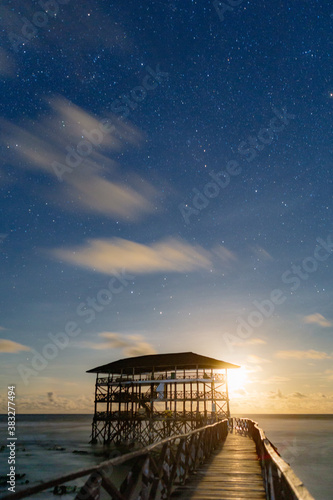Moonrise at the Cloud 9 boardwalk and tower, Siargao island.