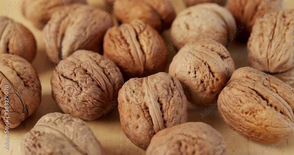 delicious and fresh walnuts on a wooden table delicious and fresh walnuts on a wooden table