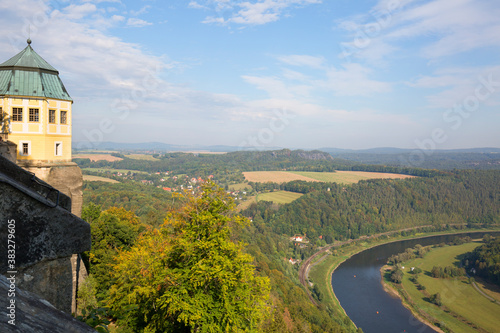 Medieval Königstein Fortress, located on a rocky hill above the Elbe River in Saxon Switzerland, Königstein, Germany photo