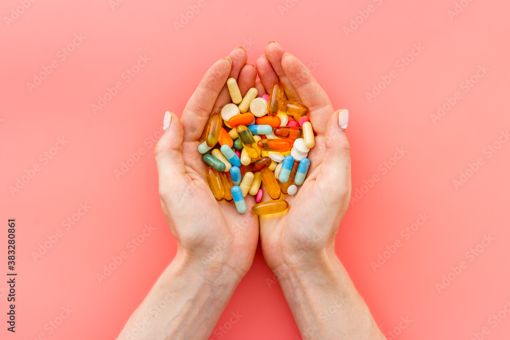 Heap of pills in hands from above Heap of pills in hands from above
