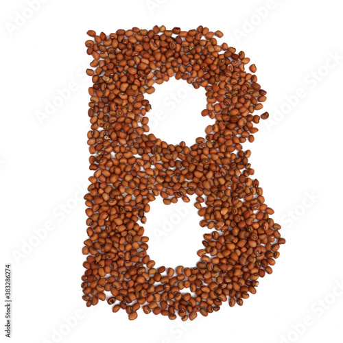 On the white background board, the letter B consists of beans