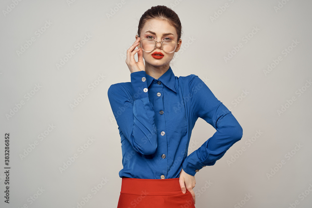 woman model in blue shirt and red skirt glasses beautiful face makeup studio woman model in blue shirt and red skirt glasses beautiful face makeup studio