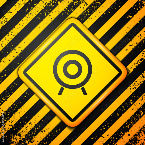 Black Target sport icon isolated on yellow background. Clean target with numbers for shooting range or shooting. Warning sign. Vector.