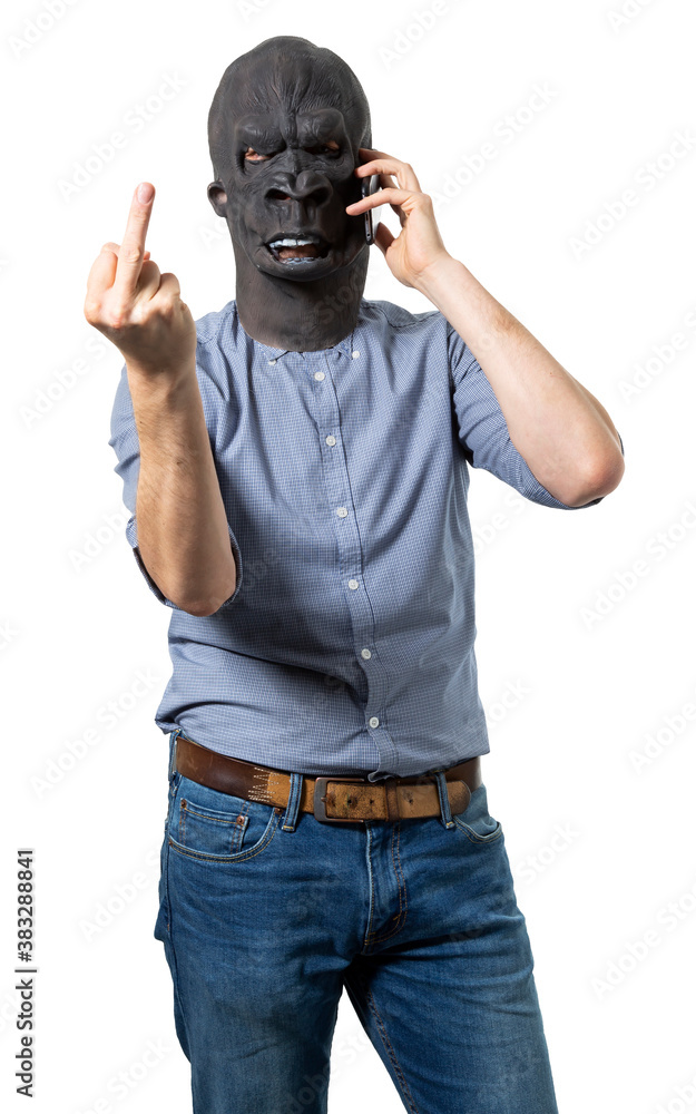 Man in Gorilla Mask Talking on Cell Phone Giving the Middle Finger Man in Gorilla Mask Talking on Cell Phone Giving the Middle Finger