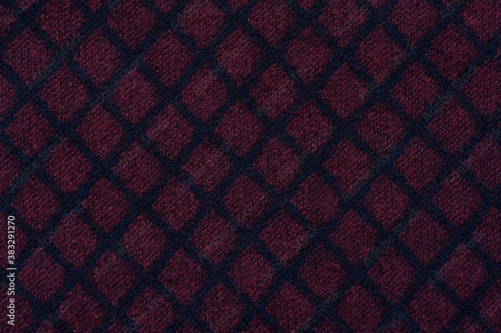 Close-up fragment of warm knitted printed sweatshirts. Concept of warm everyday things. clothing store concept. Advertising space. Place for text Close-up fragment of warm knitted printed sweatshirts. Concept of warm everyday things. clothing store concept. Advertising space. Place for text