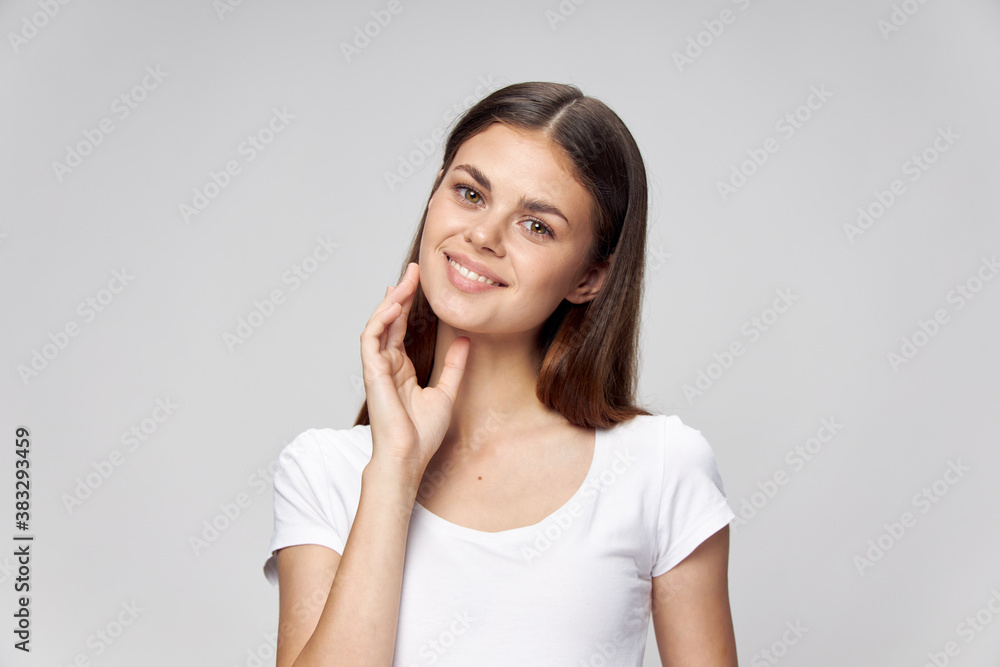 woman in white t-shirt smile cropped view woman in white t-shirt smile cropped view
