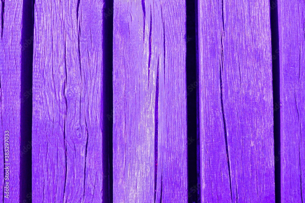 Naklejka premium Purple wooden texture background. Horizontal top view.