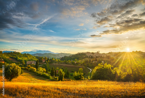 Urbino city and contryside landscape at sunset. Marche region, Italy. photo