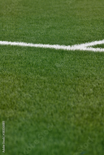 Green football field with nobody