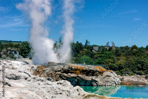 Pohutu Geyser erupting with hot pool