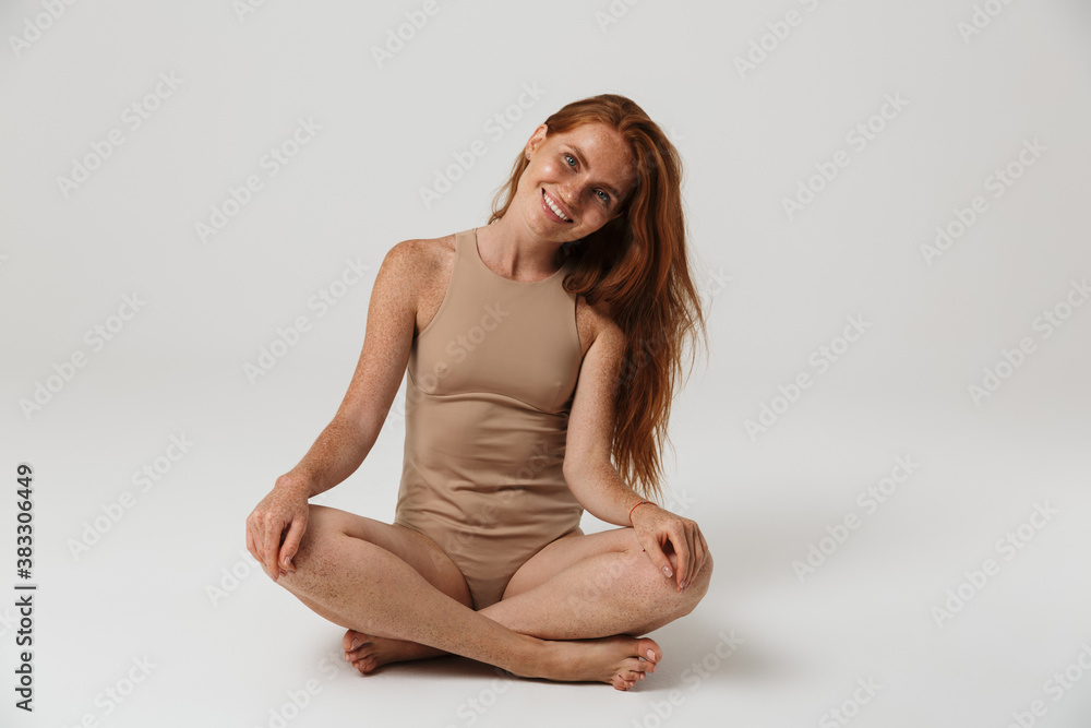 Cheerful pretty redhead woman with freckles Cheerful pretty redhead woman with freckles