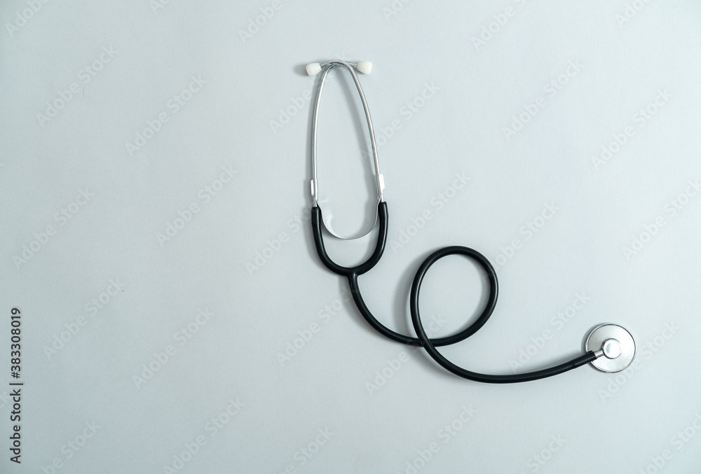 Stethoscope on gray background stock photo Stethoscope on gray background stock photo