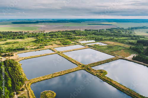 Billede på lærred Aerial View Retention Basins, Wet Pond, Wet Detention Basin Or Stormwater Manage