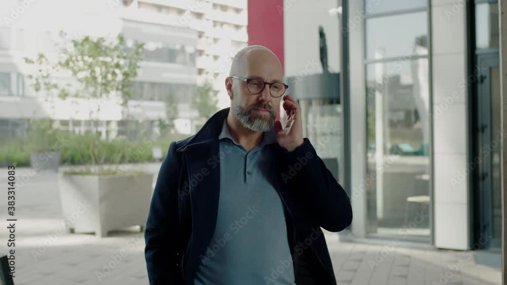 Stylish Man Pick Up Call From Wireless Earphones . Stylish Man Pick Up Call From Wireless Earphones .