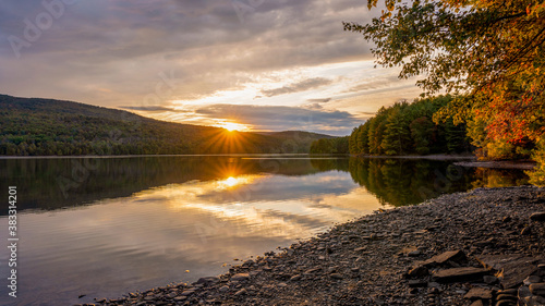 Roundout Resevoir in Catskill mountains of New York in sunset time. Colorful trees and calm lake