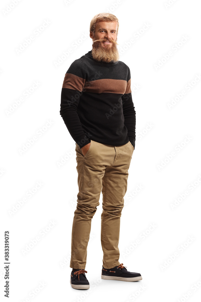 Full length portrait of a young man with blond beard and mustaches wearing a black turtle neck jumper Full length portrait of a young man with blond beard and mustaches wearing a black turtle neck jumper
