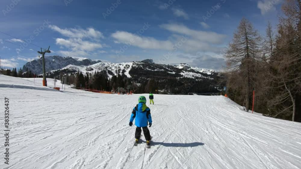 Little boy skiing.
A 6 year old child enjoys a winter holiday in the Alpine resort. Stabilized footage. Slow motion. Little boy skiing.
A 6 year old child enjoys a winter holiday in the Alpine resort. Stabilized footage. Slow motion.