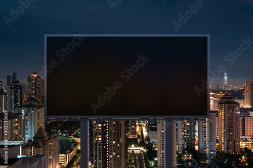 Photography Blank black road billboard with Kuala Lumpur cityscape background at night time
