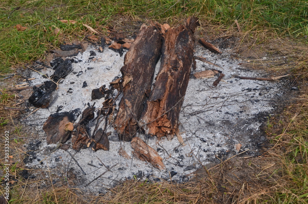 old burnt fireplace. old abandoned bonfire in a camp old burnt fireplace. old abandoned bonfire in a camp