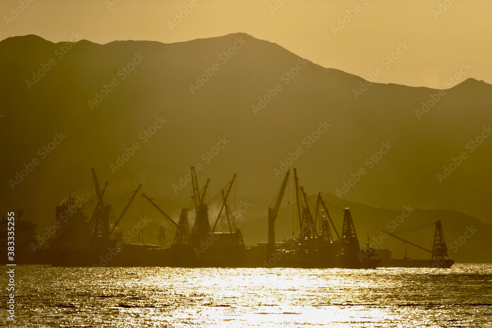 the harbor of hong kong at dusk