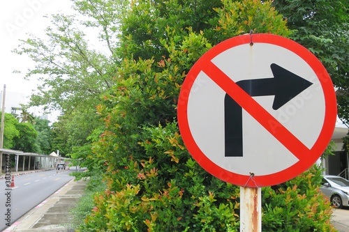 Standing traffic sign on the road, do not turn right. Sign and transportation concept. 