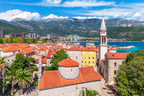 Fotografiet Citadel and the tower of St John the Baptists Church, Budva old town aerial view