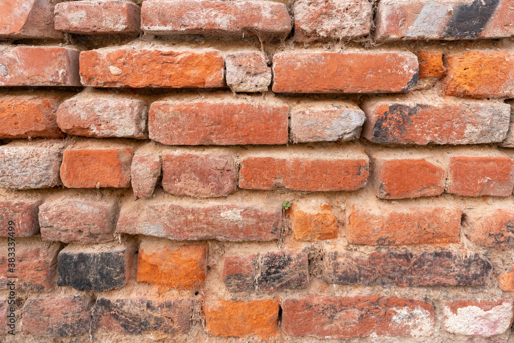 Obraz premium Orange red brick wall pattern. Orange brick texture.