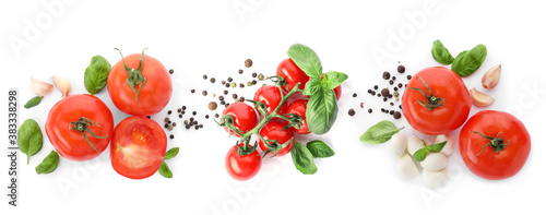 Set of ripe red tomatoes, green basil leaves, garlic and peppers mix on white background, top view