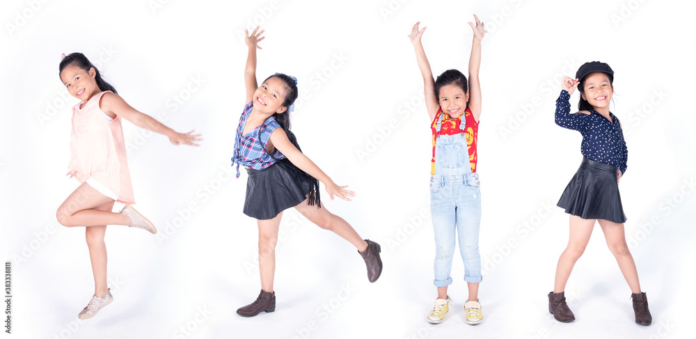 Happy children posing over white background. Asian child girl post in studio isolated. funny little kid girl childhood, fun and motion concept