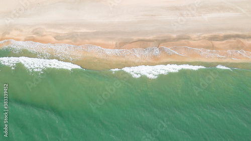 Aerial view of the beach and waves