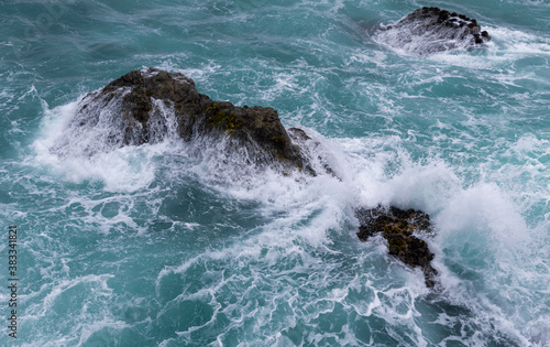 wave crashing on the rocks