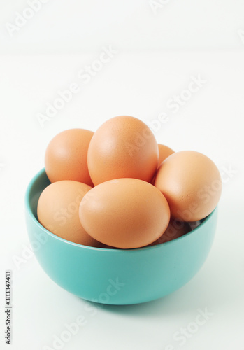 A bowl with chicken eggs 