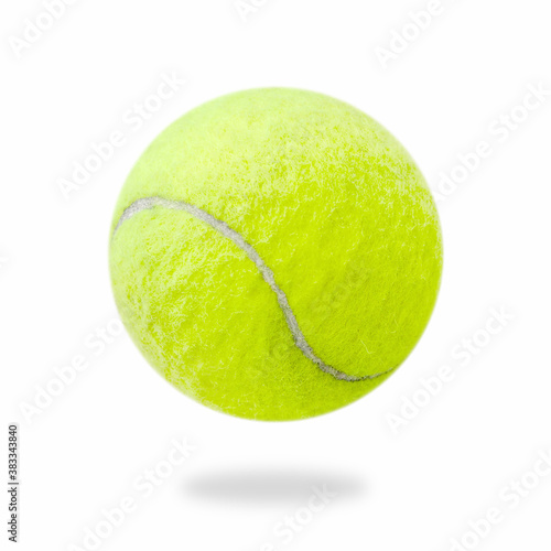 The close distance of the yellow tennis ball is pretty clear. Single ball isolated on a white background that can be easily used to make illustrations or designs © kikk