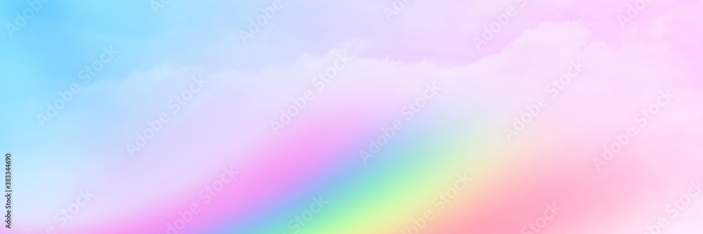 The Rainbow sky is Colorful sky with Soft clouds and a rainbow crossing. Fantasy magical sunny sky pastel background is fluffy white cloud. Freedom wallpaper concept. Sweet color dream. The Rainbow sky is Colorful sky with Soft clouds and a rainbow crossing. Fantasy magical sunny sky pastel background is fluffy white cloud. Freedom wallpaper concept. Sweet color dream.