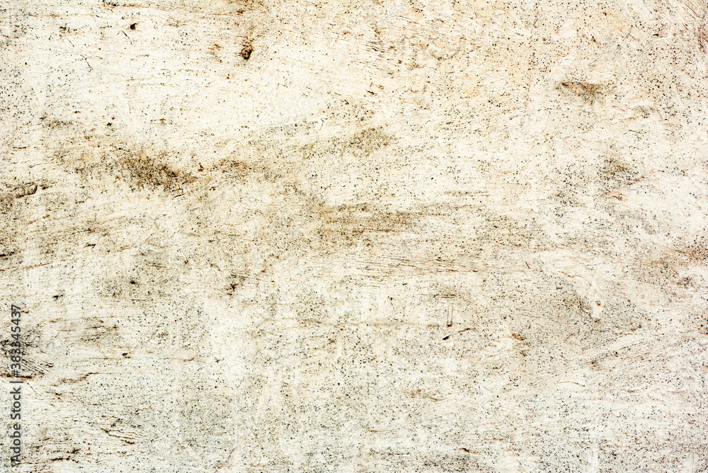 Texture of a concrete wall with cracks and scratches which can be used as a background Texture of a concrete wall with cracks and scratches which can be used as a background