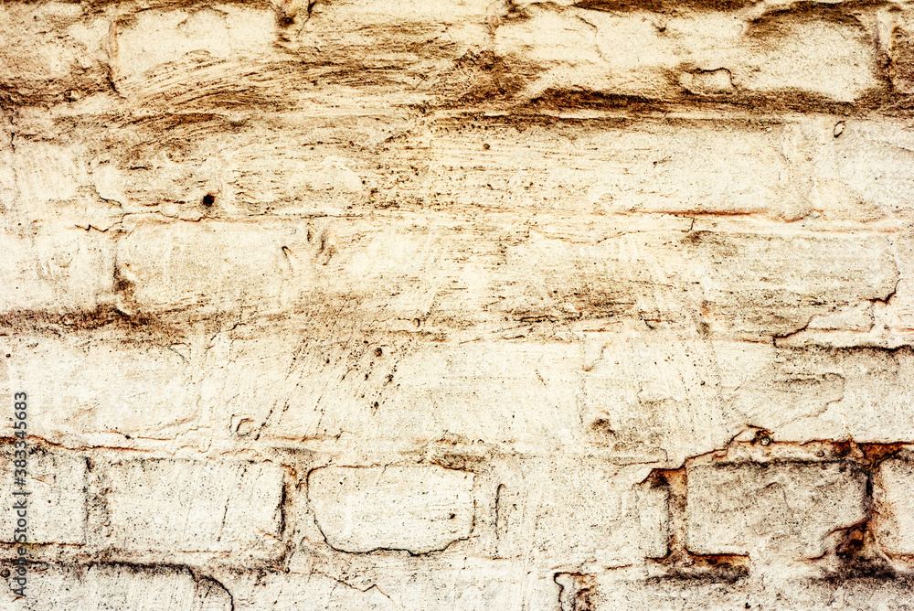 Texture of a concrete wall with cracks and scratches which can be used as a background Texture of a concrete wall with cracks and scratches which can be used as a background