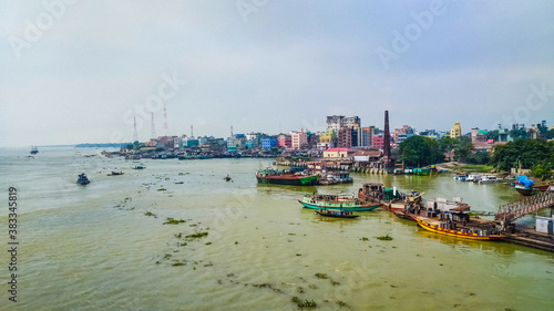 The port city Chittagong of Bangladesh is always busy and the river often remains jampacked with different-sized boats, and trollers. photo