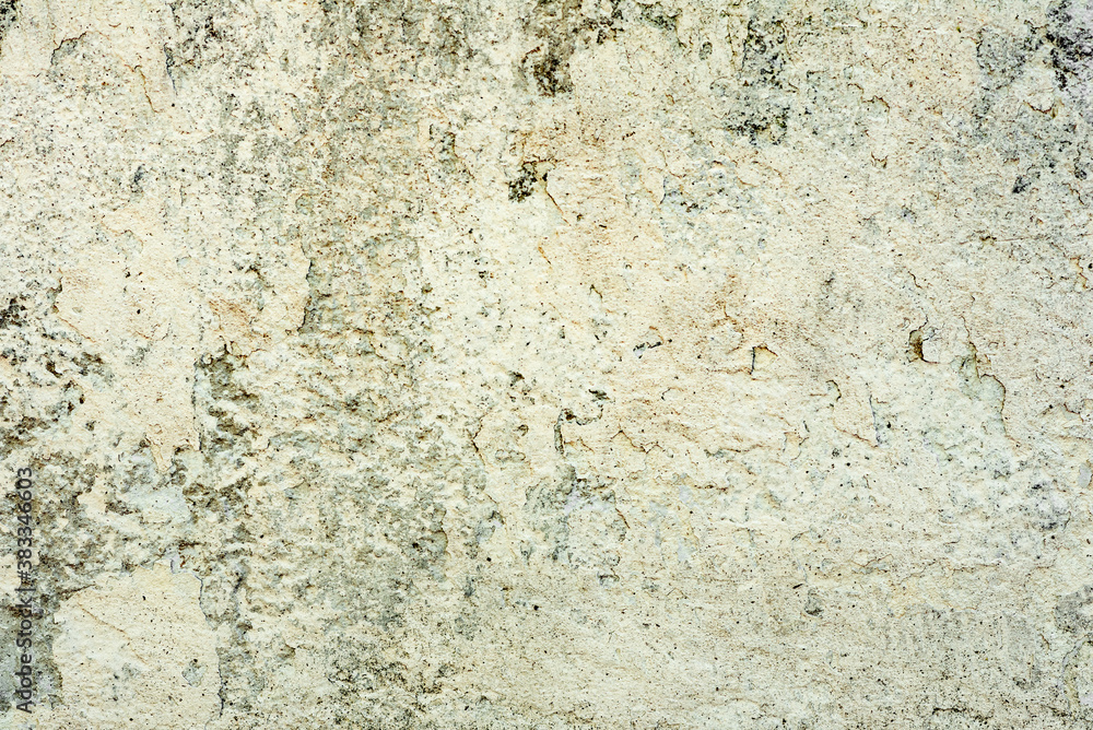 Texture of a concrete wall with cracks and scratches which can be used as a background