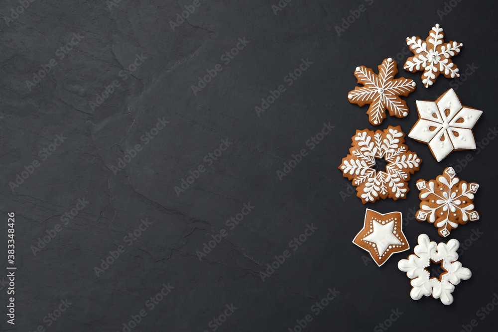 Different delicious Christmas cookies on black table, flat lay. Space for text